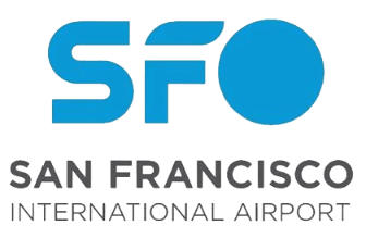 San Francisco International Airport terminal bustling with planes and travelers, highlighting a vibrant, active travel hub.